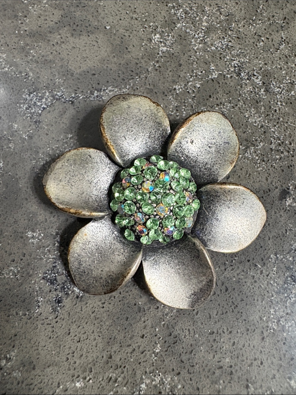 Floral Silver-Tone Brooch with Green Crystal Center
